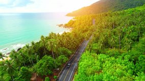 Drones fly over Khanom-Sichon Road, a beautiful viewpoint. Coastal road. Lots of coconut trees. tropical summer scenery. Nakhon Si Thammarat, Thailand. 4K drones
