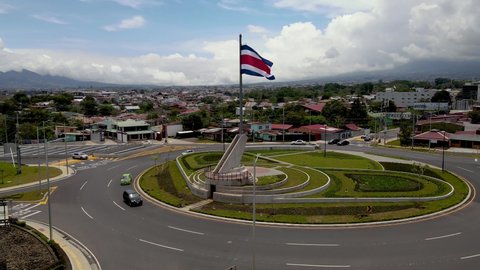 San Jose, San Jose  Costa Rica  05 05 2022: Beautiful cinematic aerial footage of the new Flag roundabout in Costa Rica, Rotonda de la bandera, un San José