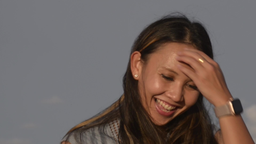 family, leisure and people concept-close-up of portrait of an asian smiling woman