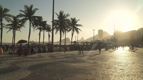 Silhouette sunset at Copacabana beach, Rio de Janeiro, Brazil