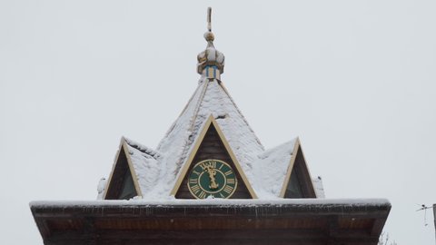 clock on the dome in winter,on the dome of the temple the clock shows 12 o'clock