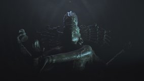 Giant Hindu god Shiva Nataraja, one of the Hindu deities. Dim, cinematic lighting. Zoom, dolly in. - Powered by Shutterstock - Get 15% off with code: PIKWIZARD15