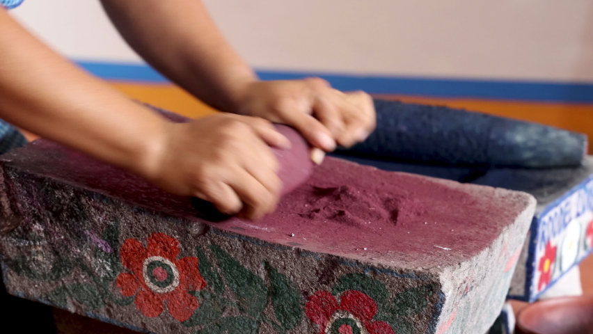 Grinding Natural Ingredients to Make Dye