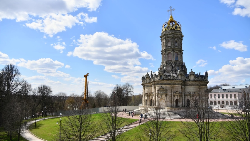 View of the Church of the Sign of the Blessed Virgin Mary in Dubrovitsy on spring day against cloudy sky. 4K Resolution time lapse video. Religious architecture theme.