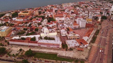 Cartagena, Colombia: Aerial drone footage of the famous colonial historic center of Cartagena along the Caribbean Coast of Colombia in South America at sunset. Shot with a motion. 