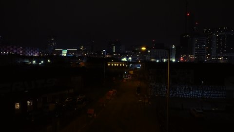 BIRMINGHAM, UK - 2022: Rising aerial view of Birmingham city centre at night