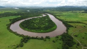aerial drone shoot view winding river, tropical rainforest, natural wilderness