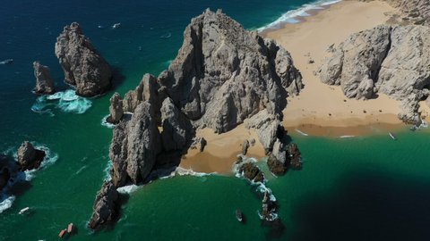 Drone shot of the sea cliffs in Cabo San Lucas Mexico, Playa del Amor and El Arco in view