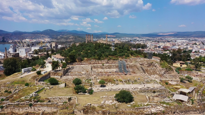 Aerial drone video of iconic archaeological site and Sanctuary of Ancient Elefsina mainly known for the Great Mysteries - the Eleusinian Mysteries, Attica, Greece