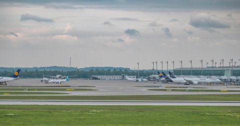 MUNICH, GERMANY - Mar 27, 2022: Munich Airport time lapse video germany tako off airport terminal
