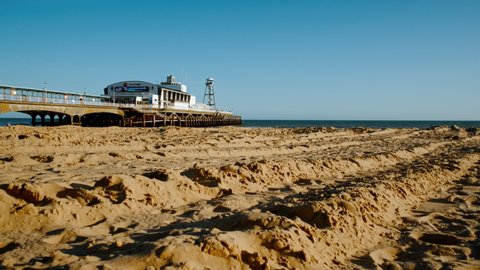 BOURNEMOUTH, circa 2022 - Establishing shot of Bournemouth Beach. Bournemouth is a seaside resort town in the county of Dorset on the south coast of England, UK
