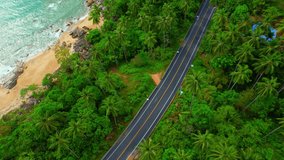 Drones are flying over beautiful beaches, roads and seas. The Gulf of Thailand. The turquoise waters are unique to the tropical seas. many coconut trees. Khanom-Sichon road. Nakhon Si Thammarat, Thai