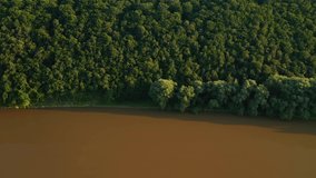 Spectacular view of the grand river and green valley. Footage from a bird's eye view. Location place Dniester River, Ukraine, Europe. Cinematic drone shot. Filmed in UHD 4k video. Beauty earth.