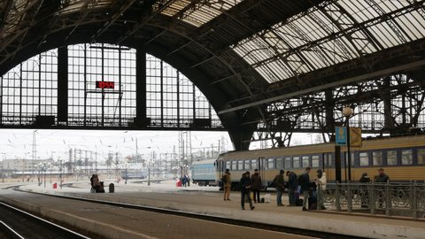 LVIV, UKRAINE - JANUARY 5, 2018: Railway platform in Lviv in winter in Ukraine. 4K, Editorial. Handheld, Pan