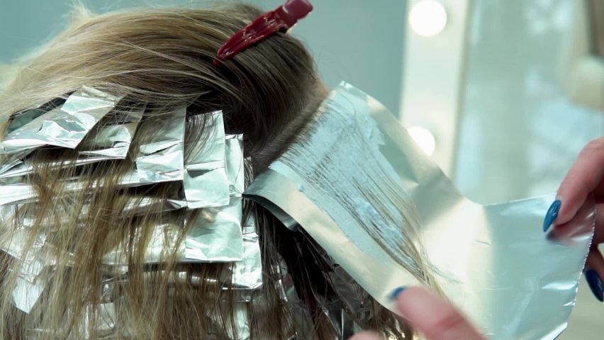 Hair salon foil coloring beauty dyeing women hairstylist hairstyle dye, from client customer from professional for brush modern, balayage shiny. Profession adult pretty, Royalty-Free Stock Footage #1090109213