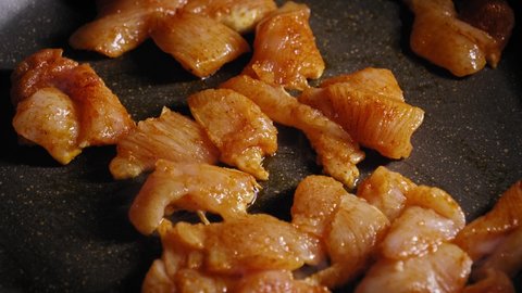 Sliced Chicken Breast Stir-frying In A Pan. Quick And Easy Recipe. close up
