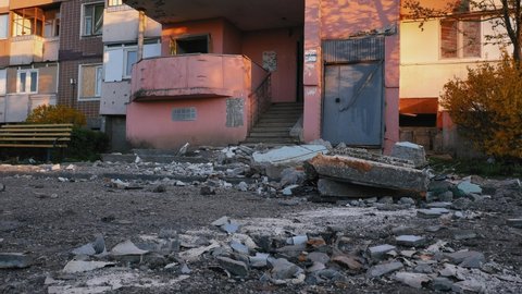 Kharkiv, Kharkov, Ukraine - 05.07.2022: Russia's invasion war against Ukraine Russian bomb hit civilian buildings shelling houses ruined home after bombing attack destroyed fragments debris outdoors