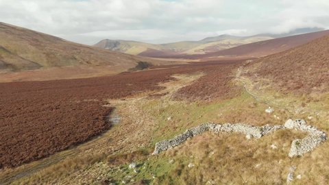 Lake District. Cumbria. March. 22. 2022. England. Flying over moorland drone footage