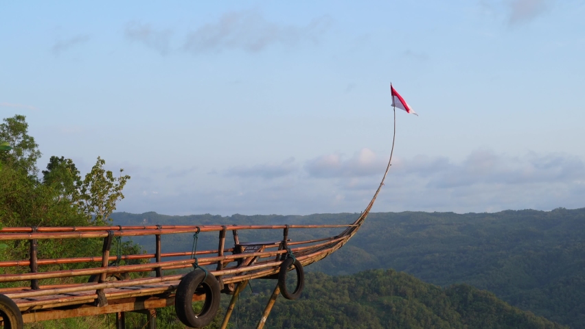 Indonesian red and white flag flying at Jurang Tembelan, Dlingo, Bantul, Yogyakarta, Indonesia