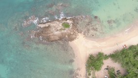 Aerial view of seashore in phuket island.Beautiful sea surface Amazing waves crashing on rocks seascape in Phuket Thailand.High quality footage from drone 4K