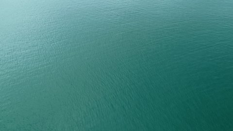 Texture of water surface, Dynamic shot Aerial view of Summer sea surface at Phuket Thailand Beautiful Tropical sea surface seashore Beautiful nature and travel background