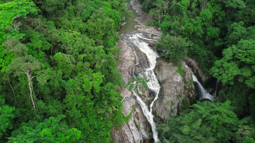 Aerial view ascending over Hin Lad majestic waterfall in Ko Samui, Thailand | Shutterstock HD Video #1090129799