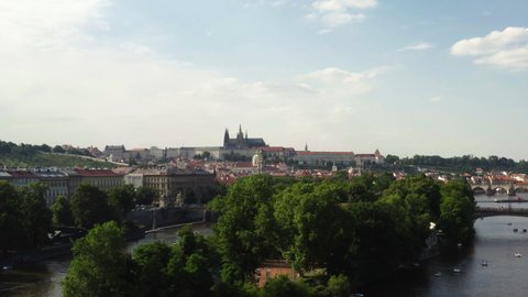 Prague castle above Vltava river and Střelecký island in Czechia, drone.