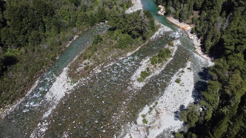 Aerial view of a cristal clear water river Cajón Del Azul in El Bolson, Bariloche - Patagonia Argentina. Drone Footage