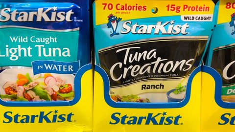 Grovetown, Ga USA - 05 10 22: Starkist Tuna pouches on a store shelf