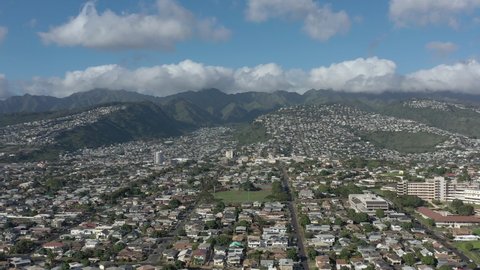 Neighborhood Aerial towards mountains on O'ahu Island in Hawaii 