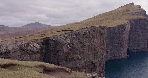 Wide Pan Right of Tralanipan Cliffside in the Faroe Islands