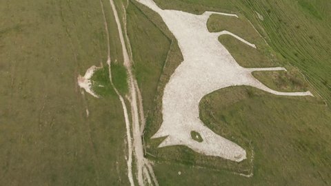 Milk Hill. Wiltshire. England. May. 1. 2022. The Alton Barnes White Horse drone footage.
