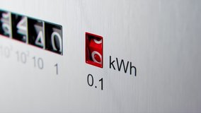 Close-up view of electrometer measuring electricity consumption. Animation with kWh counter. Electric meter display changing numbers. Concept of rising costs of electric power. Home power supply. - Powered by Shutterstock - Get 15% off with code: PIKWIZARD15