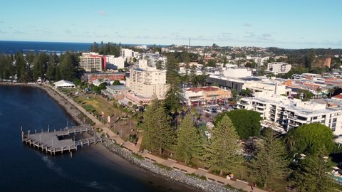Aerial drone view of rural town centre Port Macquarie on Hastings River Mid North Coast buildings tourism shops Mid North Coast NSW Australia 4K