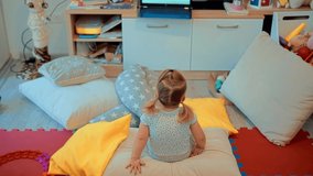 Happy Adorable Little Girl Watching Cartoon. Kids Leisure And Entertainment. Cute Children Watching Fairy Tale Story. Infant Baby Watching Television. Funny Children Enjoying Cartoons. Happy Childhood