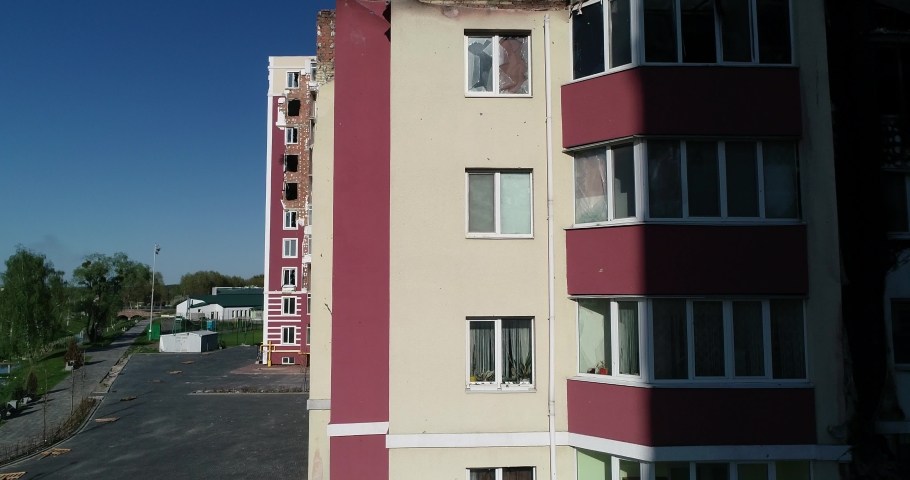 Destroyed residential modern house after air attack. War in Ukraine. Catastrophe. Holes in the walls from shells. Catastrophe. Aerial. Gostomel city. 