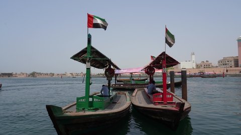 Dubai, United Arab Emirates. May 8, 2022. The abras are traditional boats made of wood. Abras are used to ferry people across the Dubai Creek. Boats waiting for passengers at the departure pier