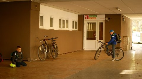OLOMOUC, CZECH REPUBLIC, MARCH 25, 2022: Refugees Ukraine accommodation rooms hostel flat apartments children family mother people bicycle cycling Center Help Ukraine, asylum humanitarian service