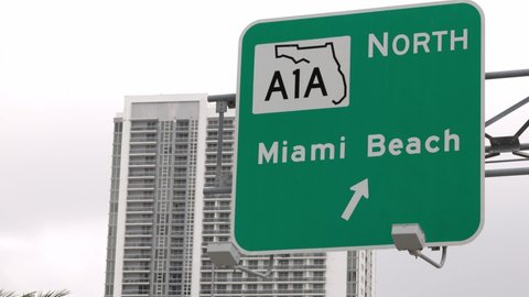 Direction sign to Miami Beach in Miami Downtown - travel photography