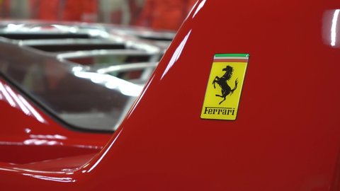 logo standing in the cabin of a ferrari close-up. moscow russia 20 april 2022