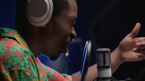 Man Sings Rap Into Microphone Headphones Stock Footage Video (100% ...