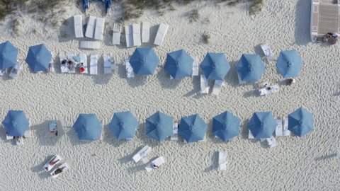Turks and Caicos White Sand Beach with Blue Beach Umbrellas