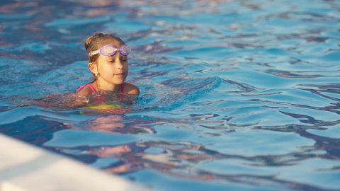 Little Girl Bright Pink Swimsuit Transparent Stock Footage Video (100% 