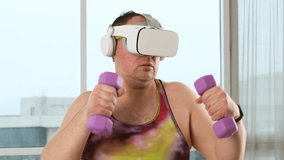 Overweight sporty man doing a weight training exercise by using dumbbell and virtual reality. VR goggles platform for online training. The innovation of virtual reality or metaverse platform concept