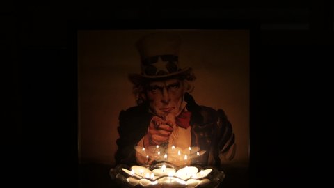 Torrox, Malaga  Spain - 05 09 2022: Uncle Sam Picture with candles lights
