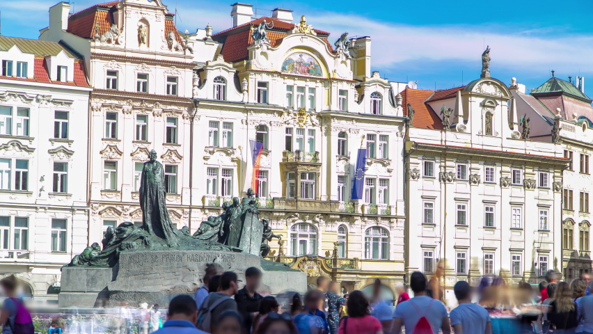 Jan Hus Memorial timelapse in Old town square in Prague, Czech Republic. People walking around. It was unveiled in 1915 to commemorate the 500th anniversary of Jan Hus martyrdom.