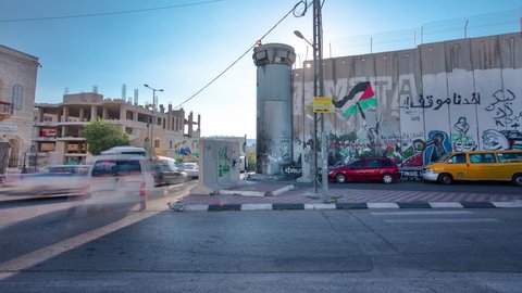 BETHLEHEM, PALESTINE - CIRCA SEPT 2019: The Israeli West Bank barrier is a separation barrier timelapse hyperlapse. Upon completion, its total length will be about 700 kilometres. Bethlehem, Palestine