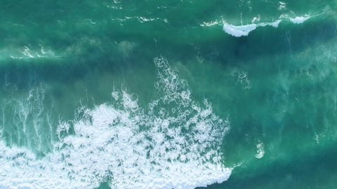Texture of sea water surface, Dynamic shot Aerial view of dark sea surface at Phuket Thailand, Beautiful Tropical sea surface seashore Amazing nature and travel background
