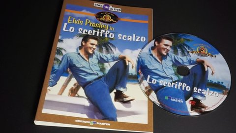 Rome, Italy - May 10, 2022, cover and dvd detail, Lo sceriffo scalzo (Follow That Dream), with Elvis Presley, 1962 film directed by Gordon Douglas, based on Richard Powell's book Crazy Holidays.