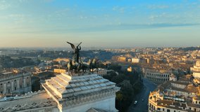 The Altare della Patria in Rome.
Backlight aerial view on the Roman Forum and Colosseum with the sunrise sun. - Powered by Shutterstock - Get 15% off with code: PIKWIZARD15